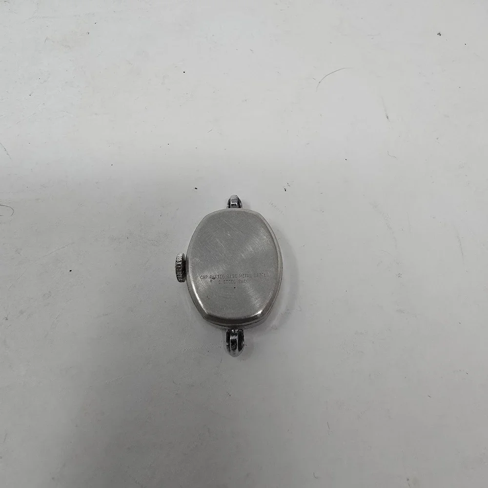 Vintage Timex Womens Oval Watch Face Silver Tone Chrome Plated Base Metal Bezel